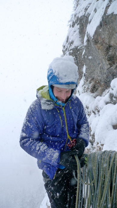 James Parkinson about to begin a potentially unpleasant belay stint in some dubious weather. The Haglofs Barrier Pro II Belay Jacket gets a thorough test!