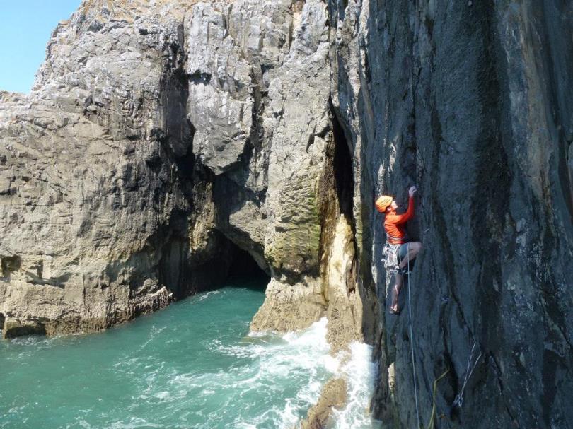 Arc'teryx Morphic Zip Neck Long Sleeve Top - a great cut for climbing rock or ice. Here in use on the Pembrokeshire sea cliffs, South Wales.